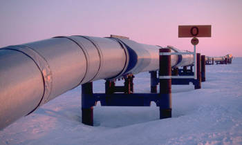 photo of the oil pipe-line snaking-off across the snow