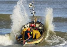 Cromer fishermen head out in the swells