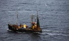 fishing boat makes its way into Uig on the Isle of Skye