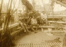 The crew of the smack Welcome in Lowestoft trawl basin, in about 1905