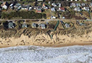 Bungalows now 'on the edge' at Hemsby South Marrams (South of Hemsby Gap)  People are living in many of them full time (!)
